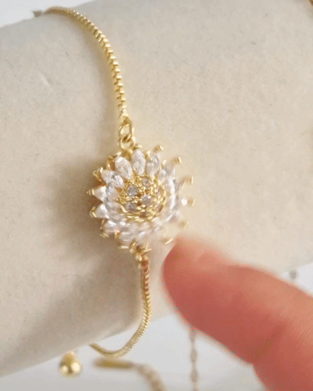 Brazalete flor giratorio anti-estrés